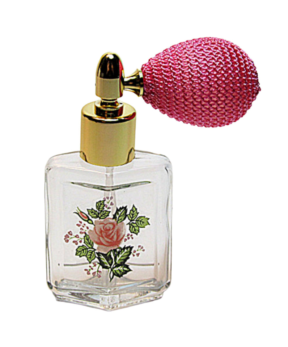 Floral perfume bottle with bulb spray attachment.