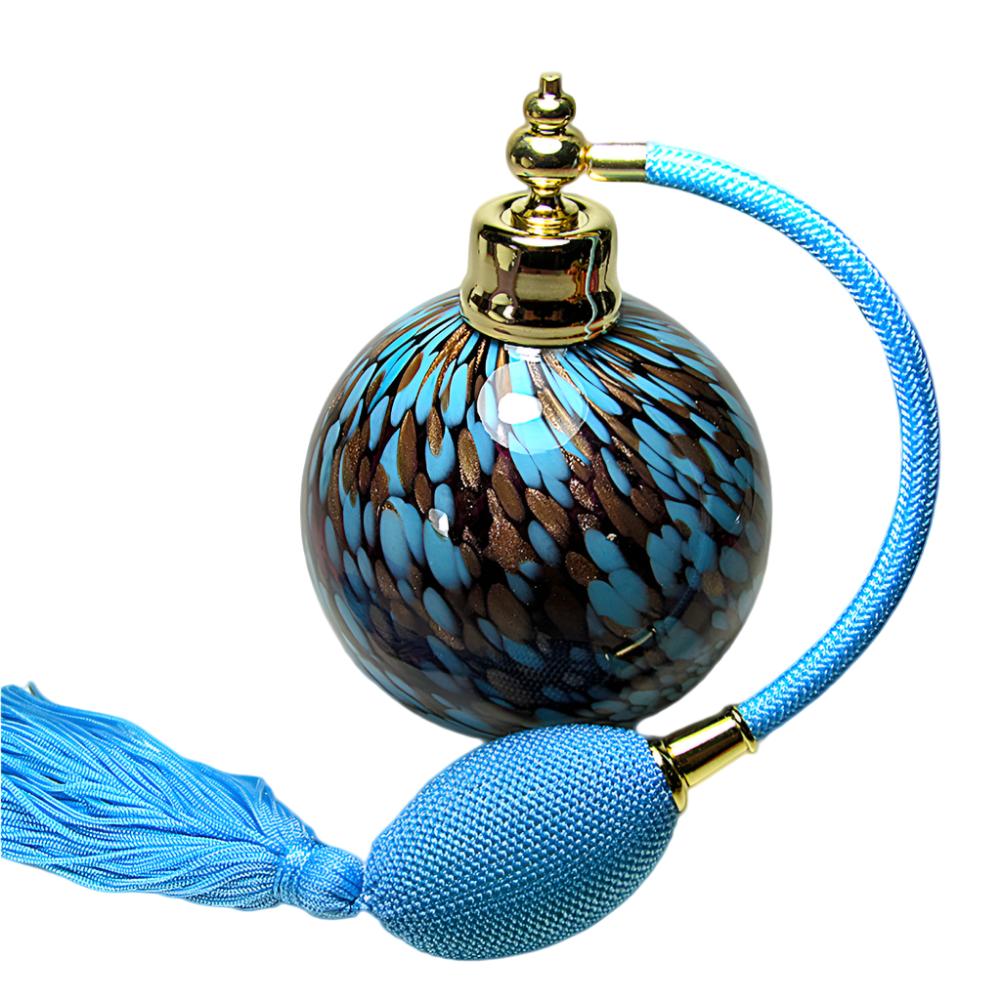 Mouth blow art crystal glass perfume bottle with squeeze bulb and tassel spray attachment.