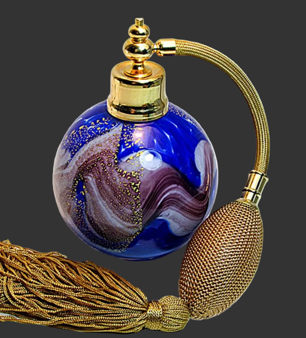 Art crystal glass perfume bottle with gold Bulb ahd tassel spray mounting.
