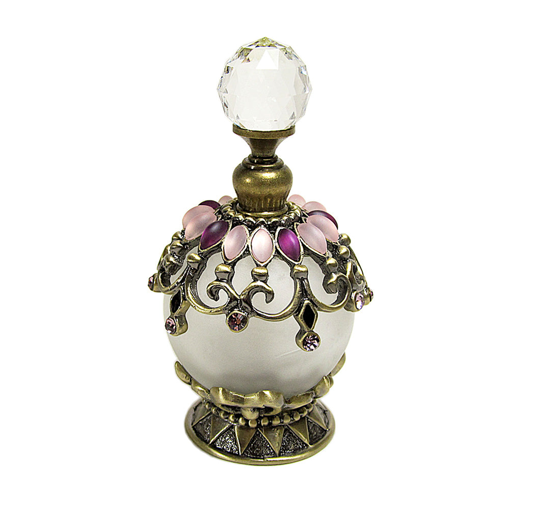 Antique perfume bottle with crystal screw cap and rod.