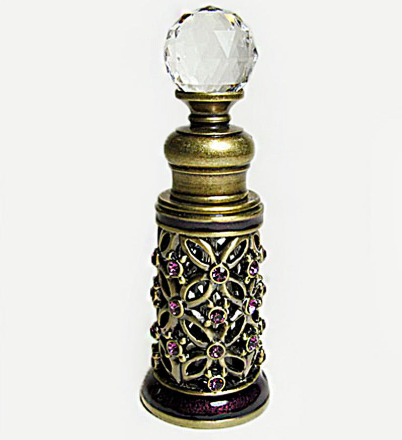 Antique perfume bottle with crystal cap and rod.