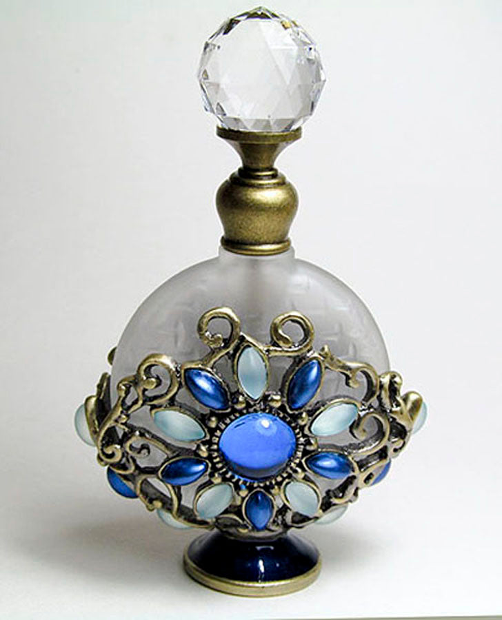 Antique perfume bottle with crystal screw cap and rod.