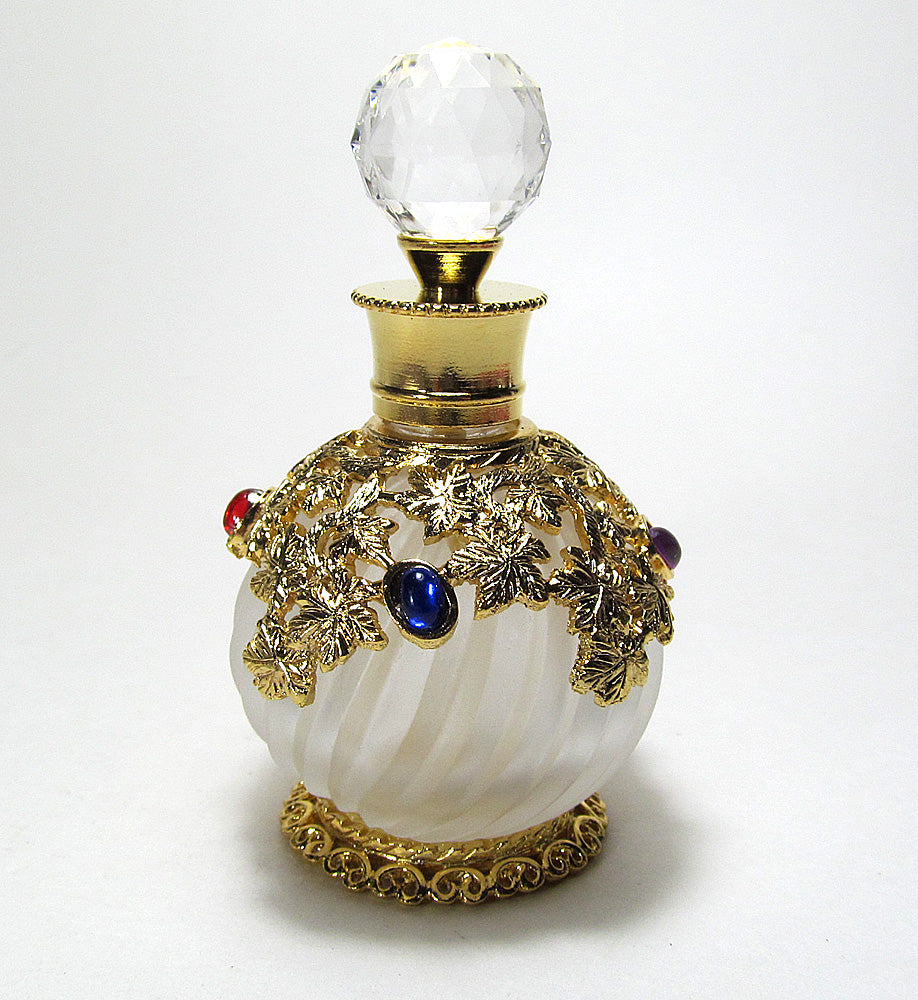 Antique perfume bottle with crystal screw cap and rod.