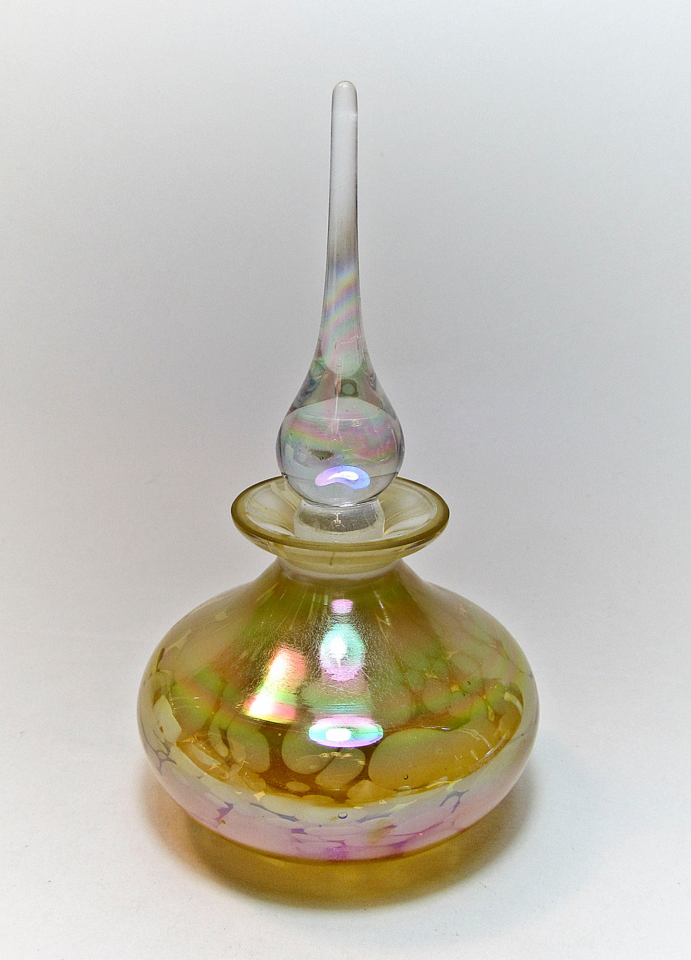 Art crystal perfume bottle with crystal stopper.