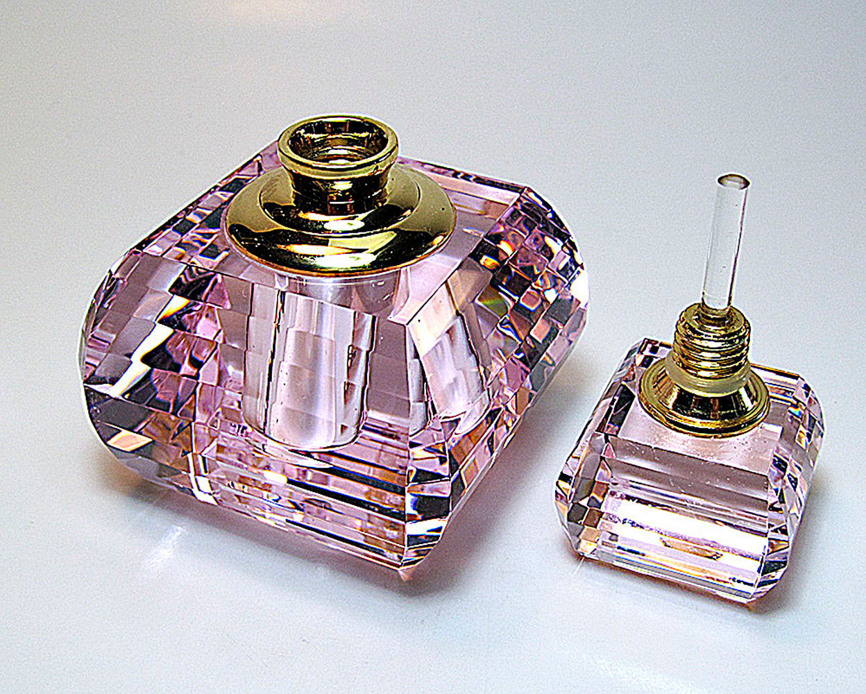 Lead Pink Crystal Perfume Bottle With Pink Crystal Stopper And Rod.
