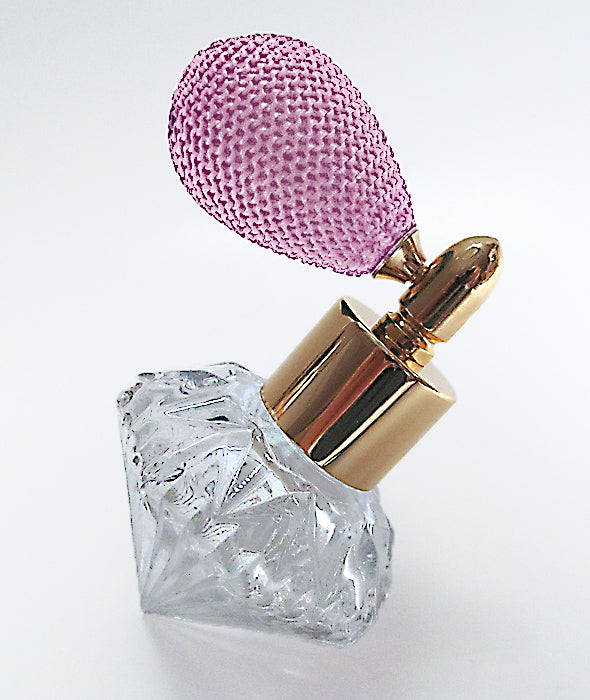 Fancy Shape Glass Perfume Bottle With Pink Bulb Spray Attachment.