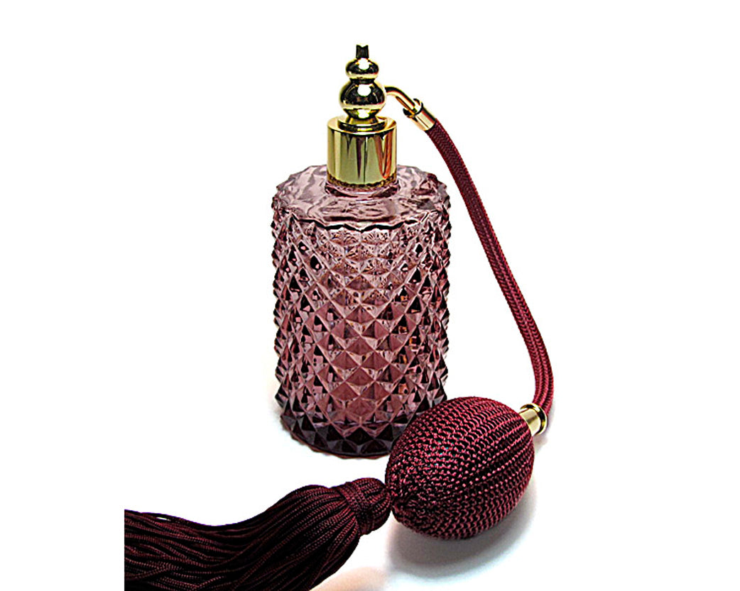 Vintage Red Purple Glass Perfume Bottle With Burgundy Bulb And Tassel Spray Attachment.