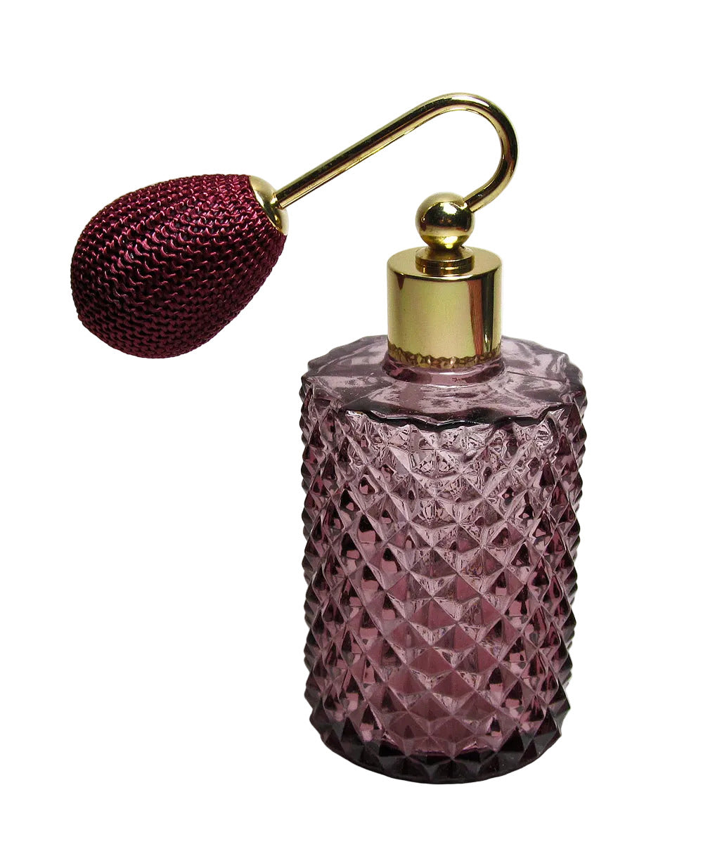 Decorative purple perfume bottle with a gold cap on a white background