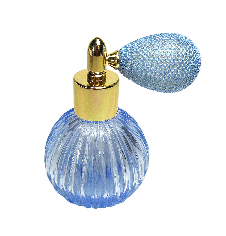 Refillable spray bottle