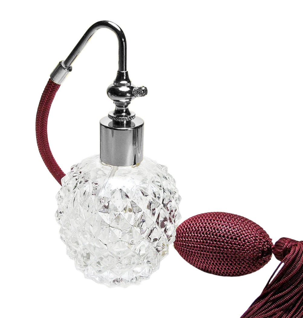 Crystal perfume bottle with a red tassel 