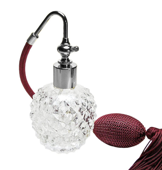 Crystal perfume bottle with a red tassel 