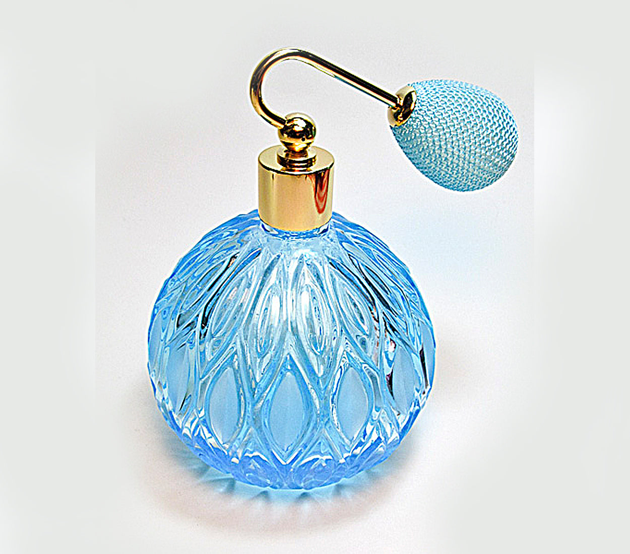 Vanity Turquoise Crystal Engraved Perfume Bottle With Bulb Spray Attachment.