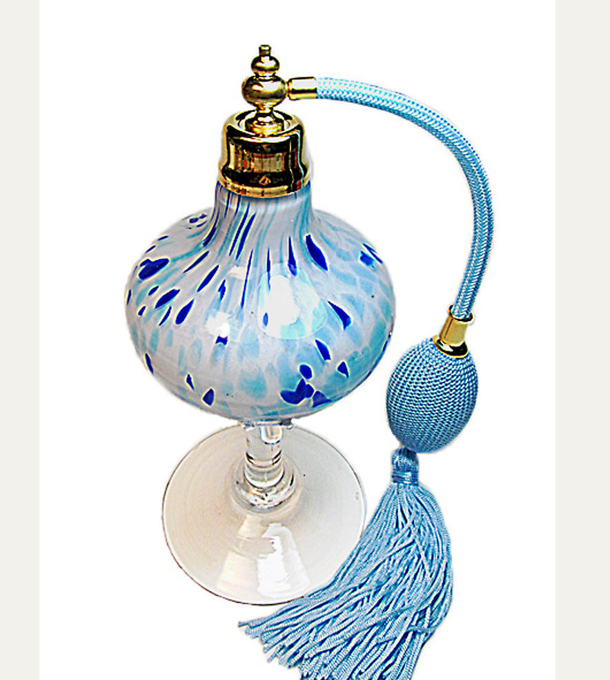 Art perfume bottle with cyan colour bulb and tassel spray mounting.