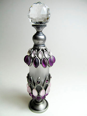 Antique perfume bottle with crystal cap and rod.