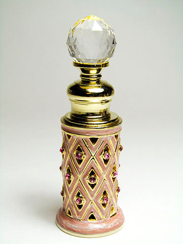 Antique perfume bottle with crystal cap and rod.