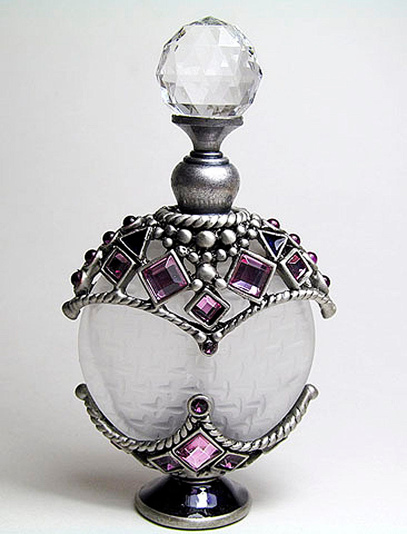 Antique perfume bottle with crystal screw cap and rod.