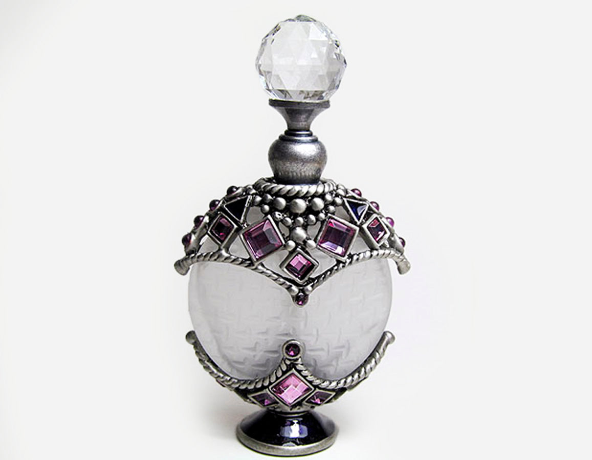 Antique perfume bottle with crystal screw cap and rod.
