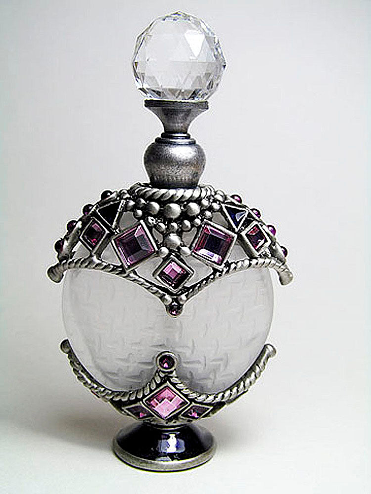 Antique perfume bottle with crystal screw cap and rod.