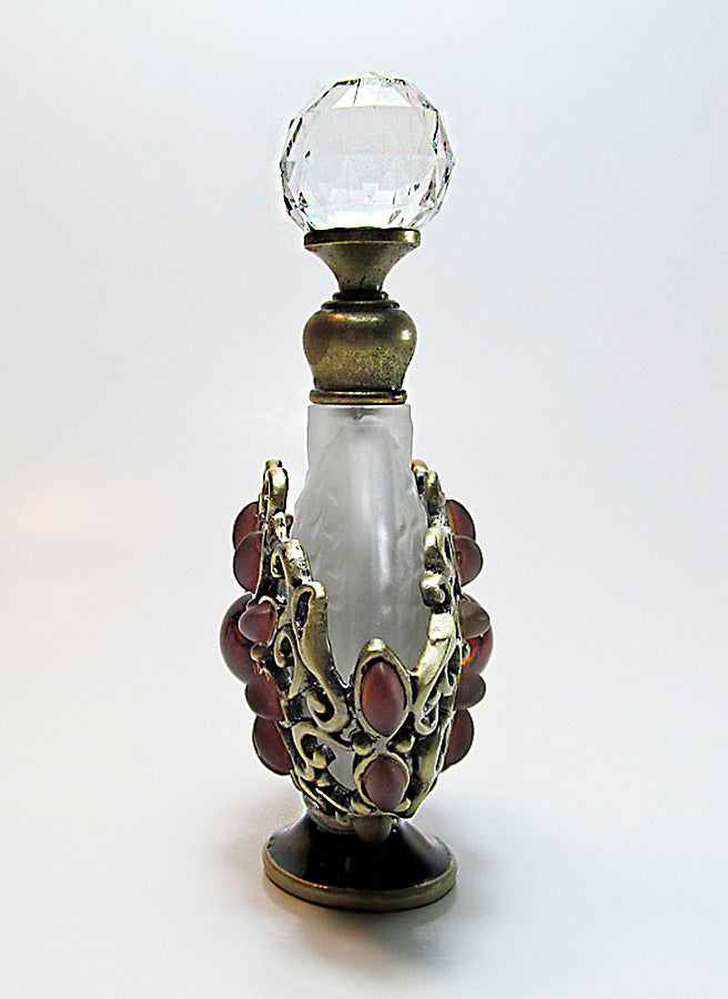 Antique perfume bottle with crystal screw cap and rod.
