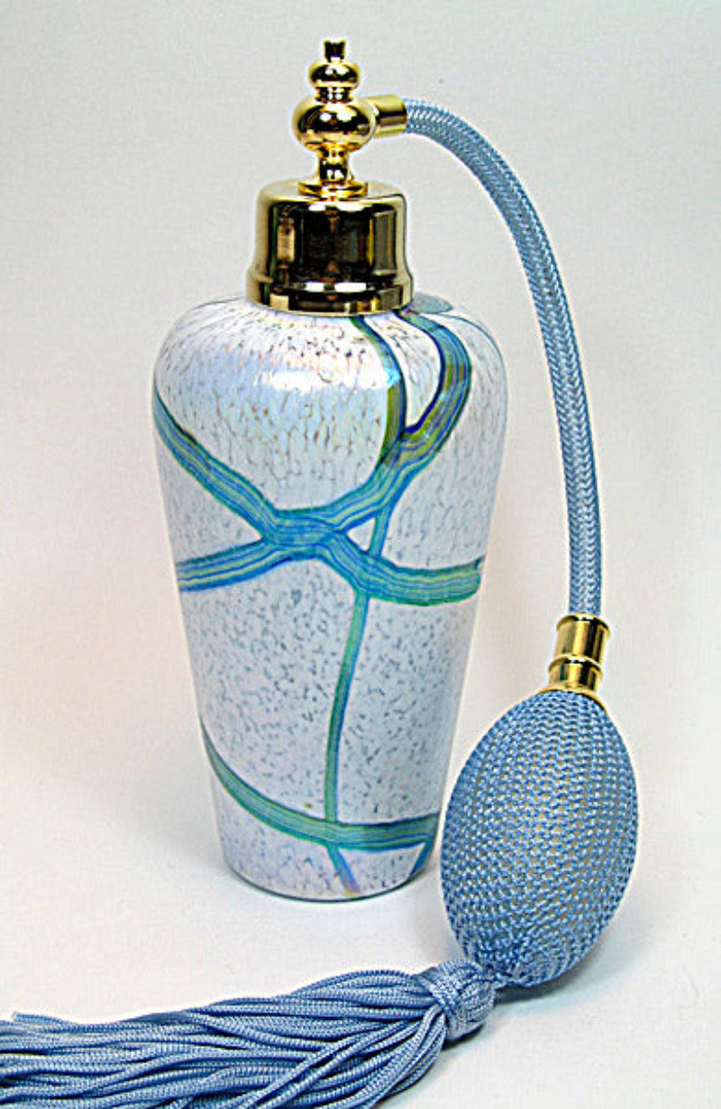 Art crystal glass perfume bottle with light blue bulb and tassel spray mounting.