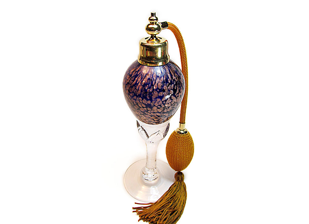 Art crystal glass perfume bottle with brown gold bulb and tassel spray mounting.