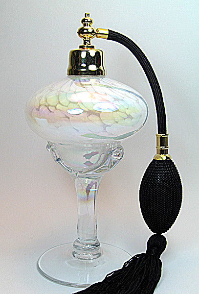 Art hand made perfume bottle with black bulb and tassel spray mounting.