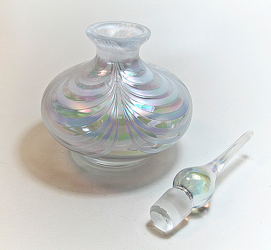 Refillable perfume bottle with stopper
