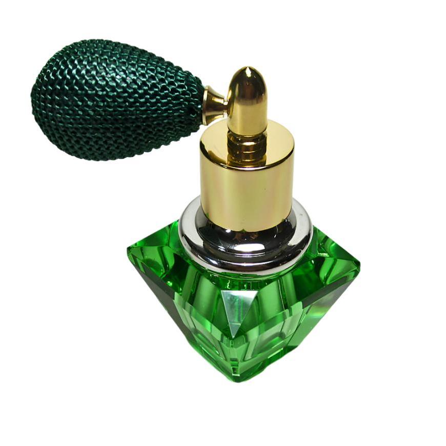 green perfume bottle