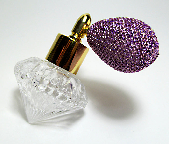 Fancy Shape Glass Perfume Bottle With Purple Bulb Spray Attachment.