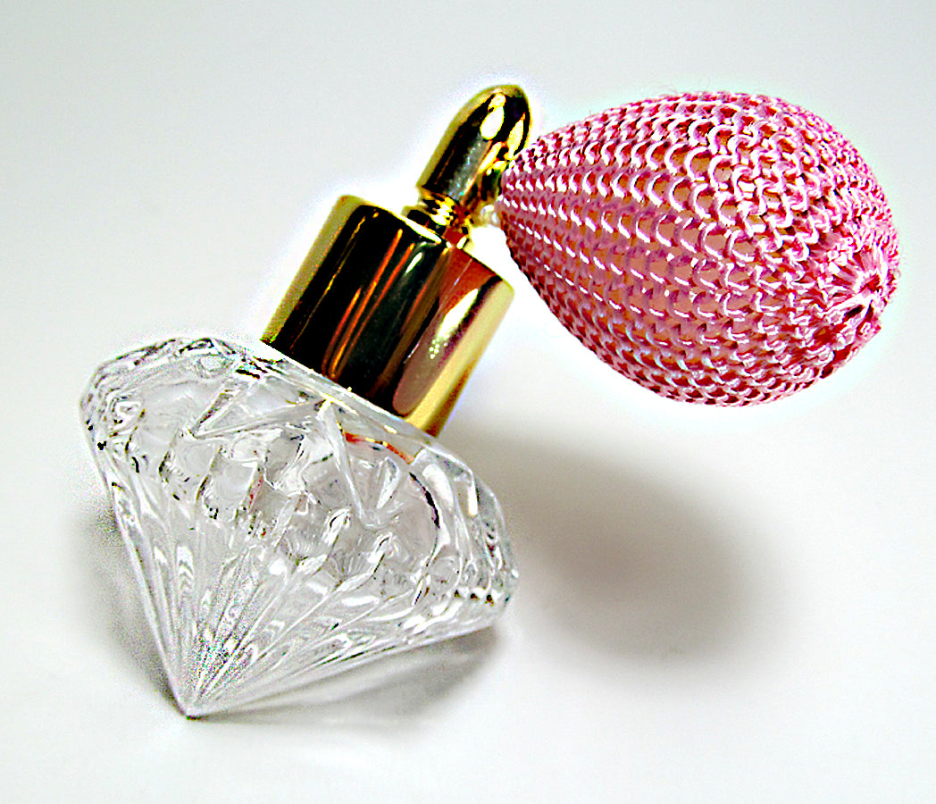 Fancy Shape Glass Perfume Bottle With Pink Bulb Spray Attachment.